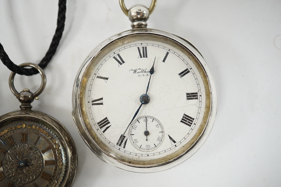 A George V Waltham silver open faced key wind pocket watch (a.f.), a 935 white metal open faced pocket watch and an 800 white metal fob watch. Condition - poor